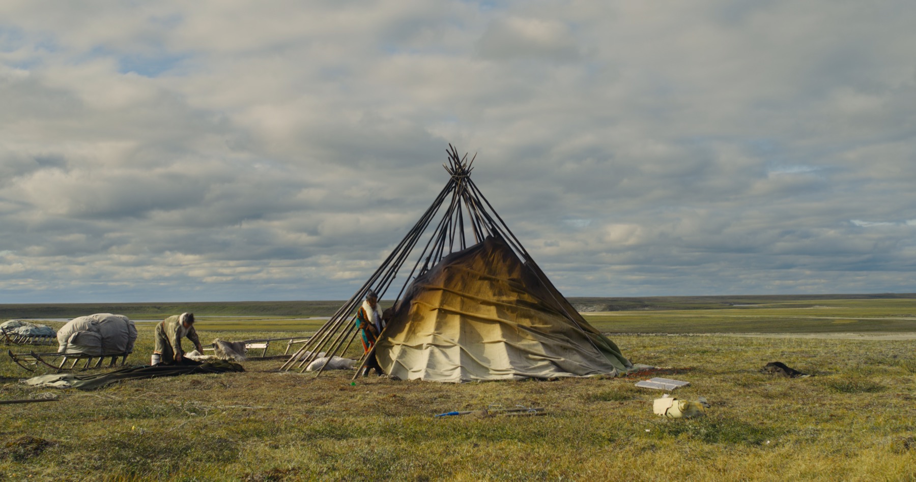 A Nenets family’s camp beneath the vast sky of the Yamal tundra, from The Wind Has No Tail